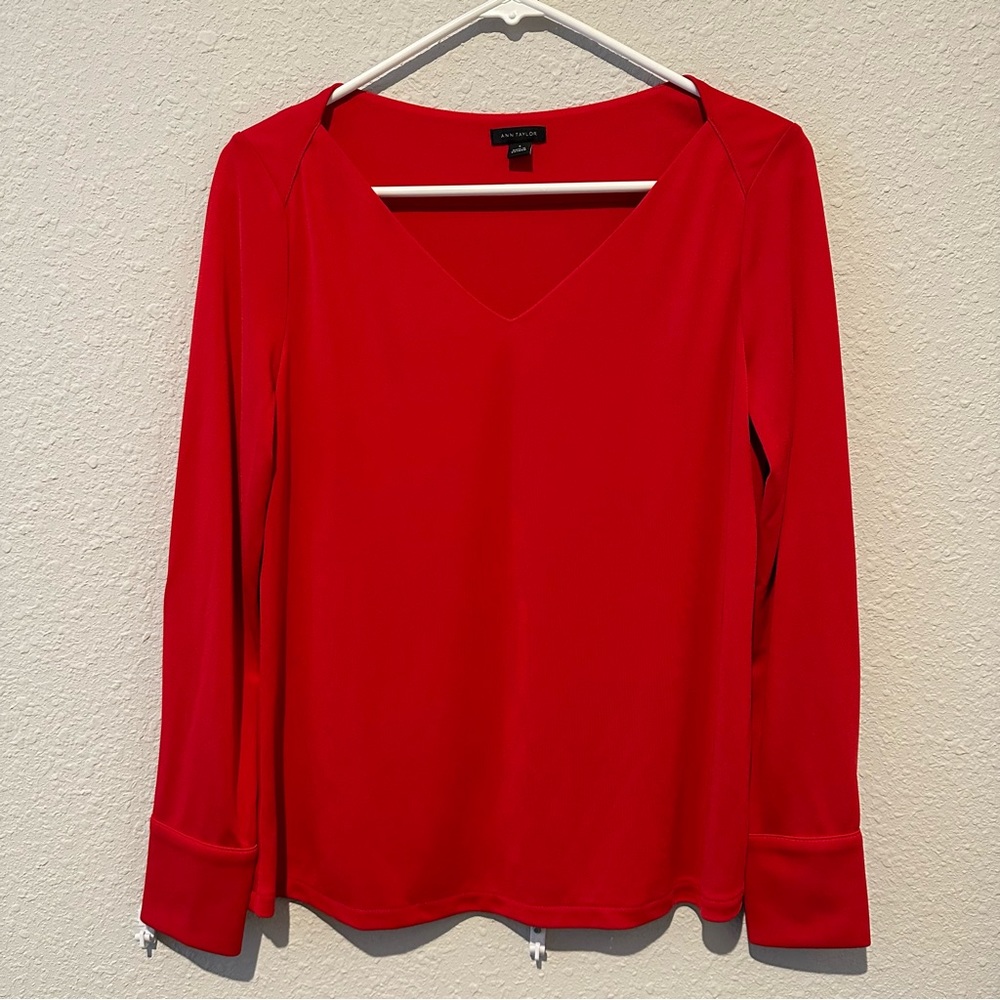 Beautiful red Ann Taylor blouse, size small. Cute buttons on bottom of sleeves.